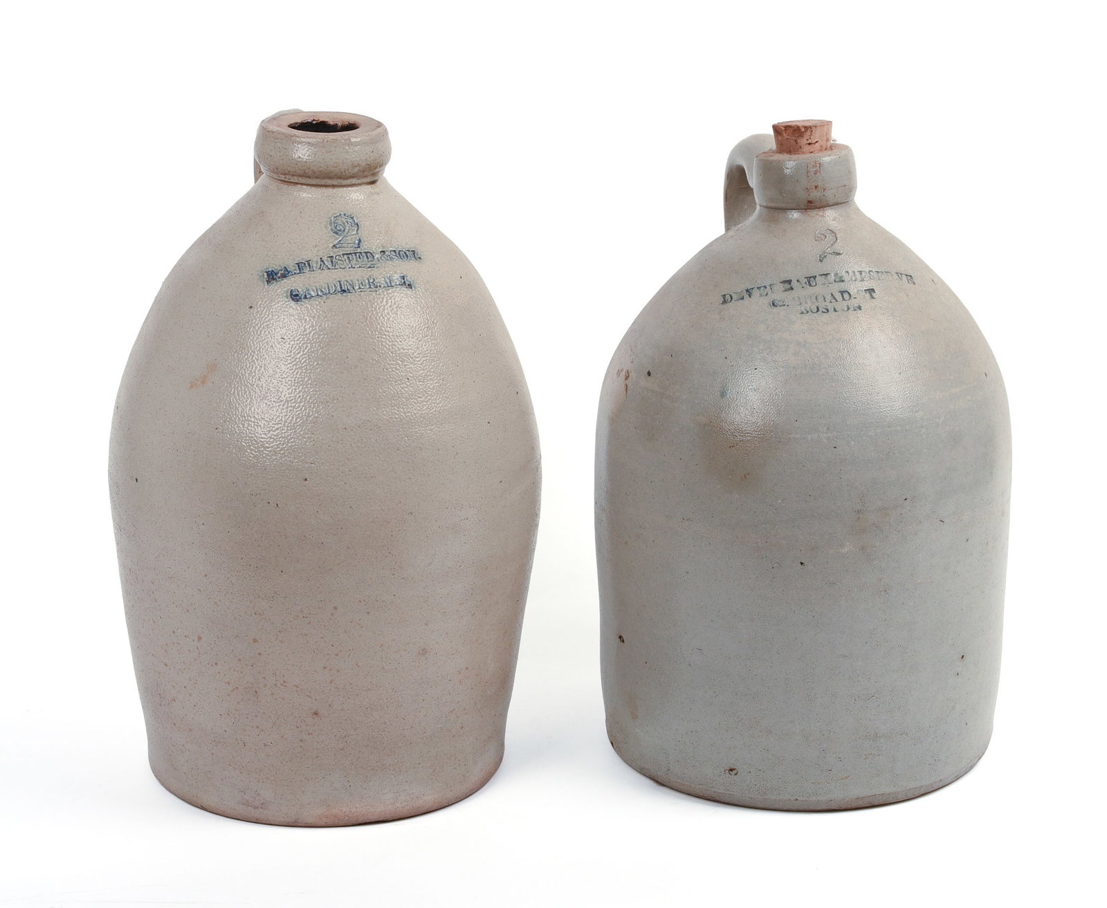TWO TWO-GALLON STONEWARE JUGS.: Plaisted & Son, Gardiner, ME, and Devereaux & Meserve, Boston, MA. Heights 14, and 15 inches. Small crack to Boston jug.