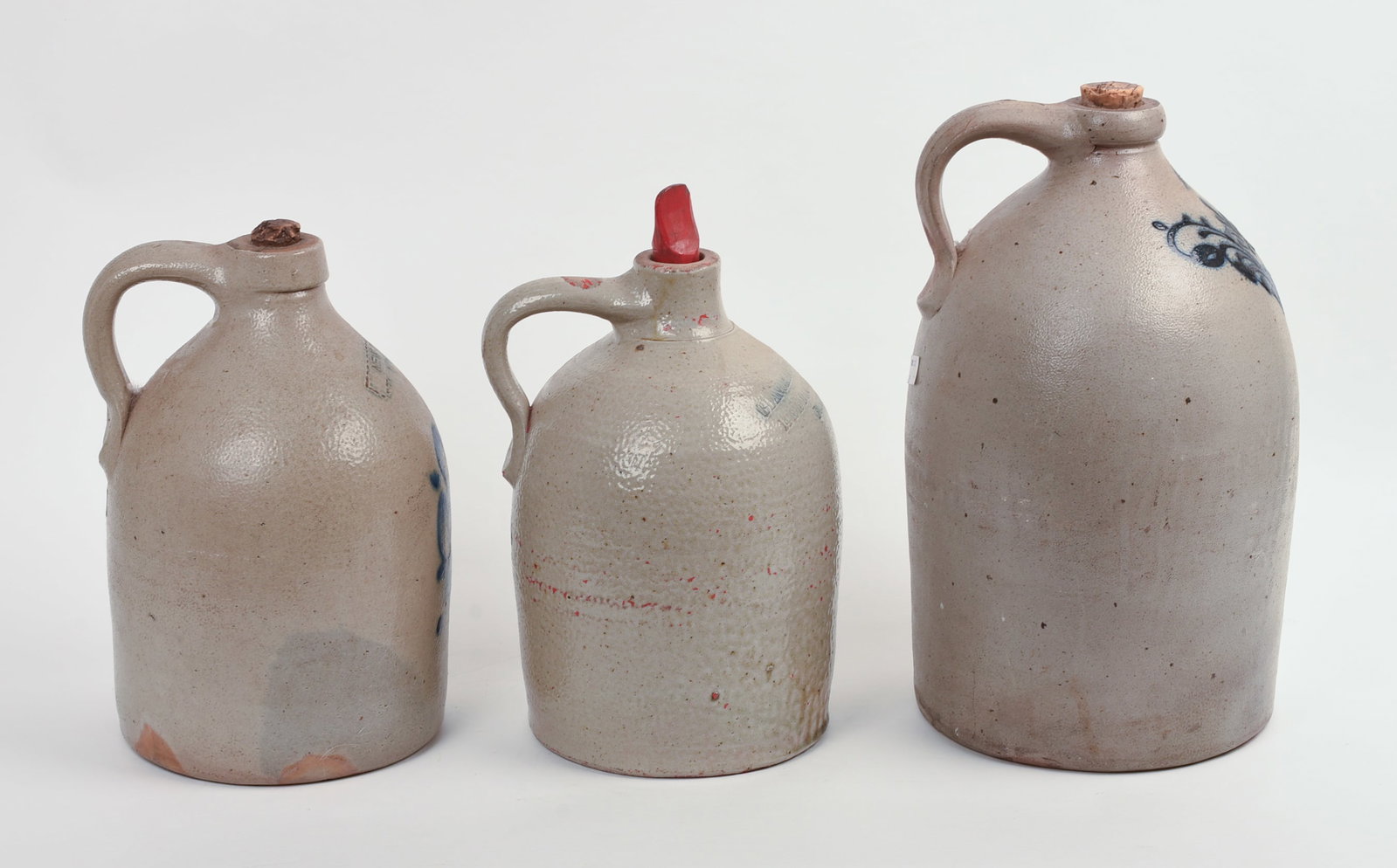 THREE STONEWARE JUGS. - 3