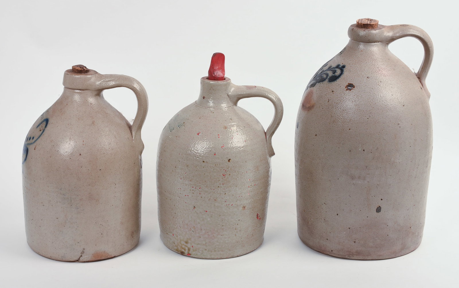 THREE STONEWARE JUGS. - 5