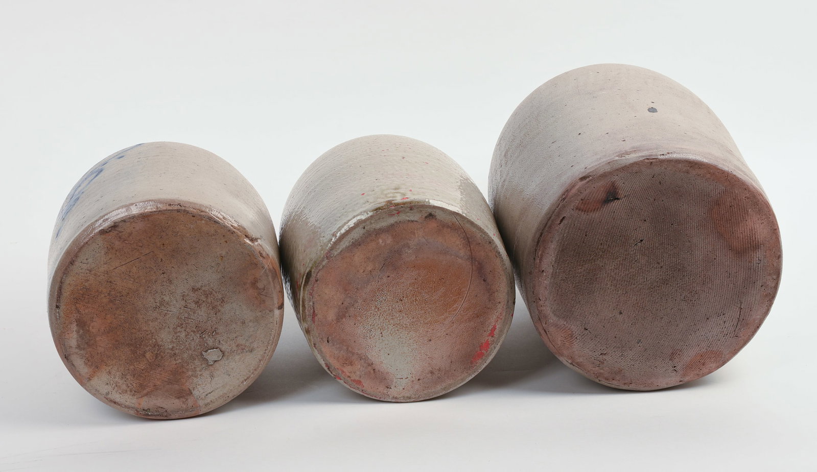 THREE STONEWARE JUGS. - 6