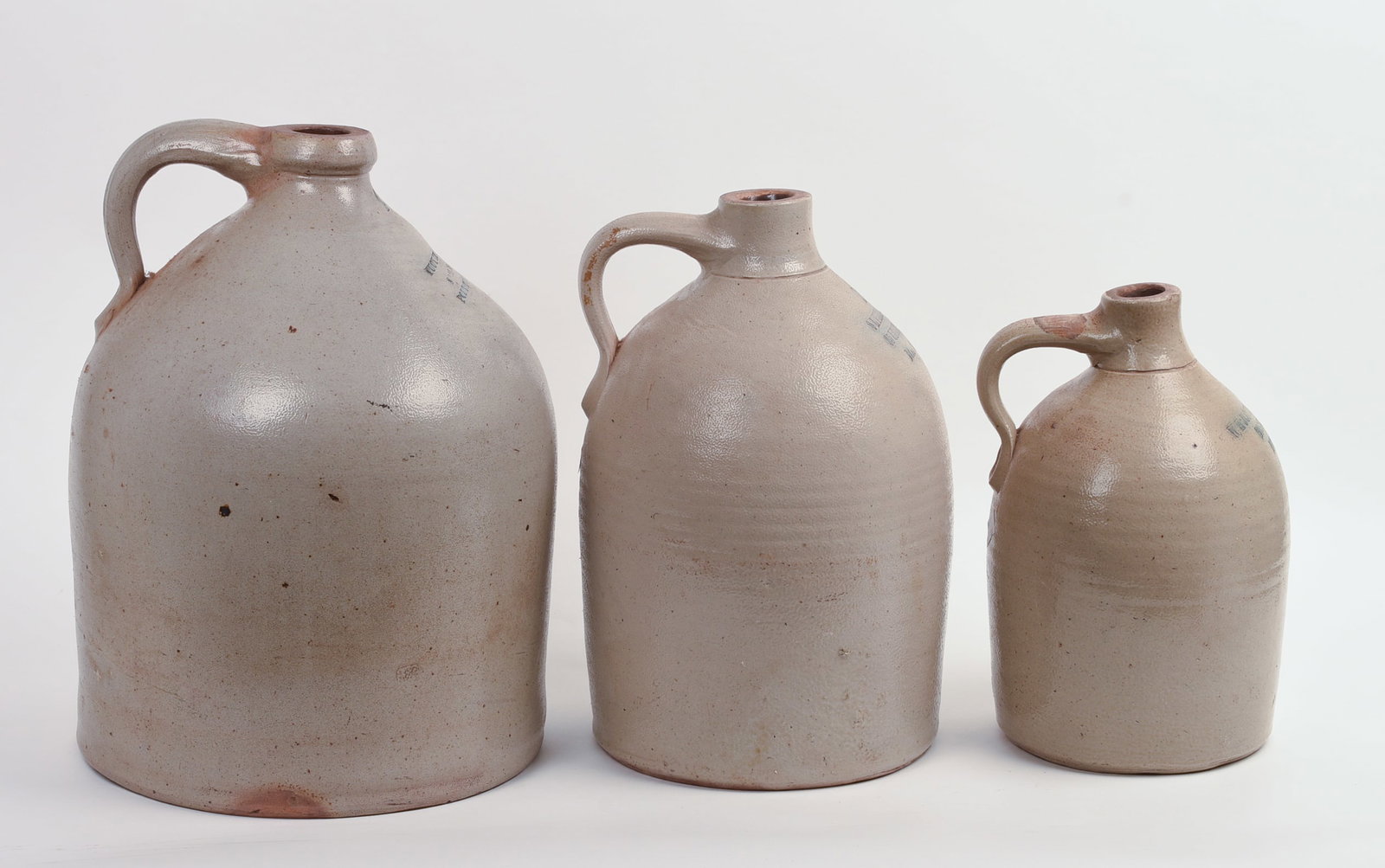 THREE STONEWARE JUGS. - 2