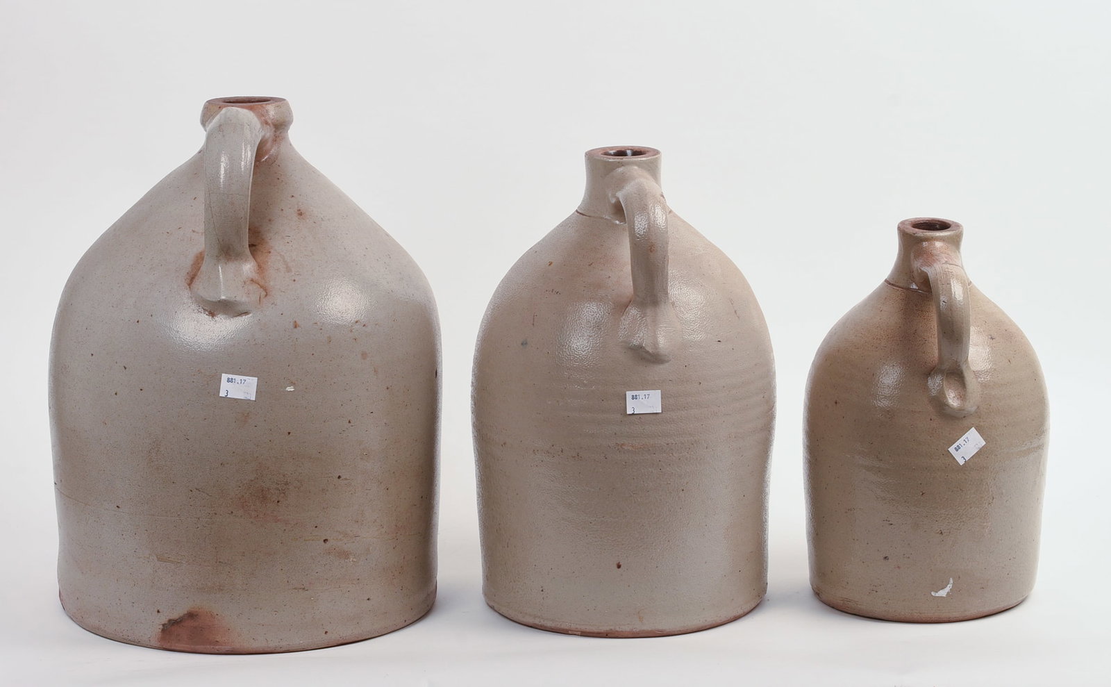 THREE STONEWARE JUGS. - 3