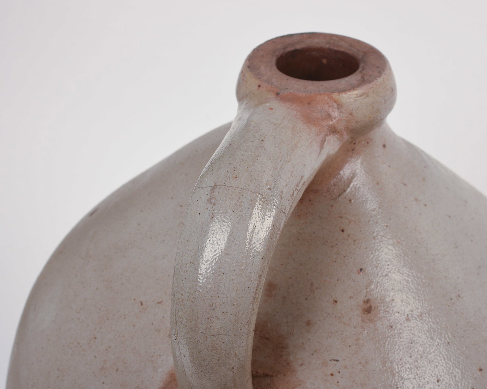 THREE STONEWARE JUGS. - 4