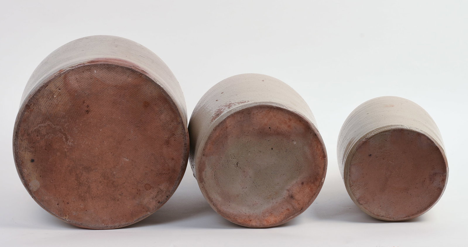 THREE STONEWARE JUGS. - 6