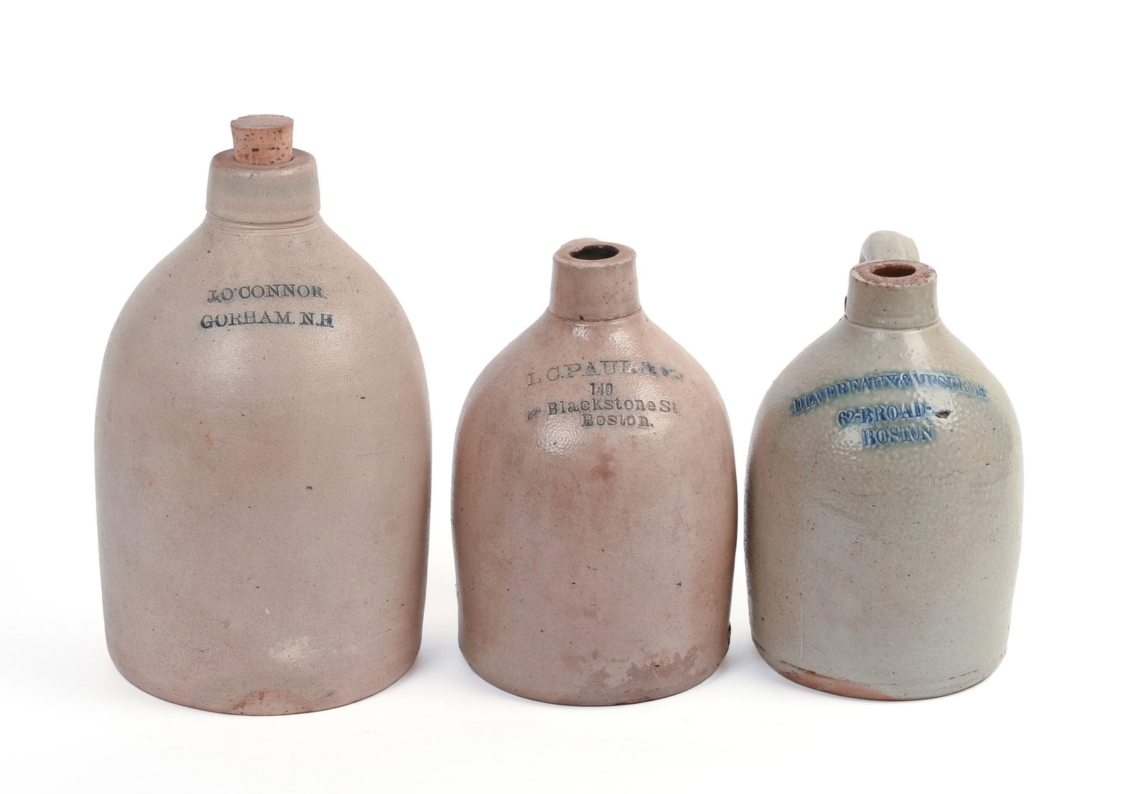 THREE STONEWARE JUGS.: J.O. Connor, Gorham, NH, height 12 inches. L.C. Paul & Co, Boston, height 10 inches. Devereaux & Meserve, Boston, Height 10 inches.