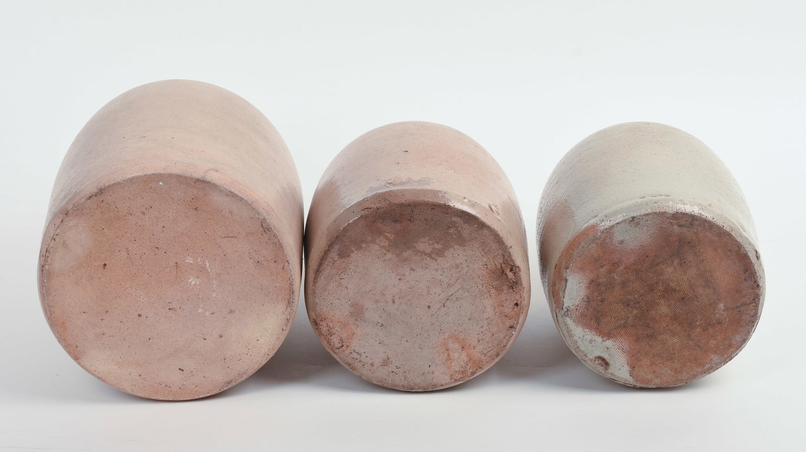 THREE STONEWARE JUGS. - 5