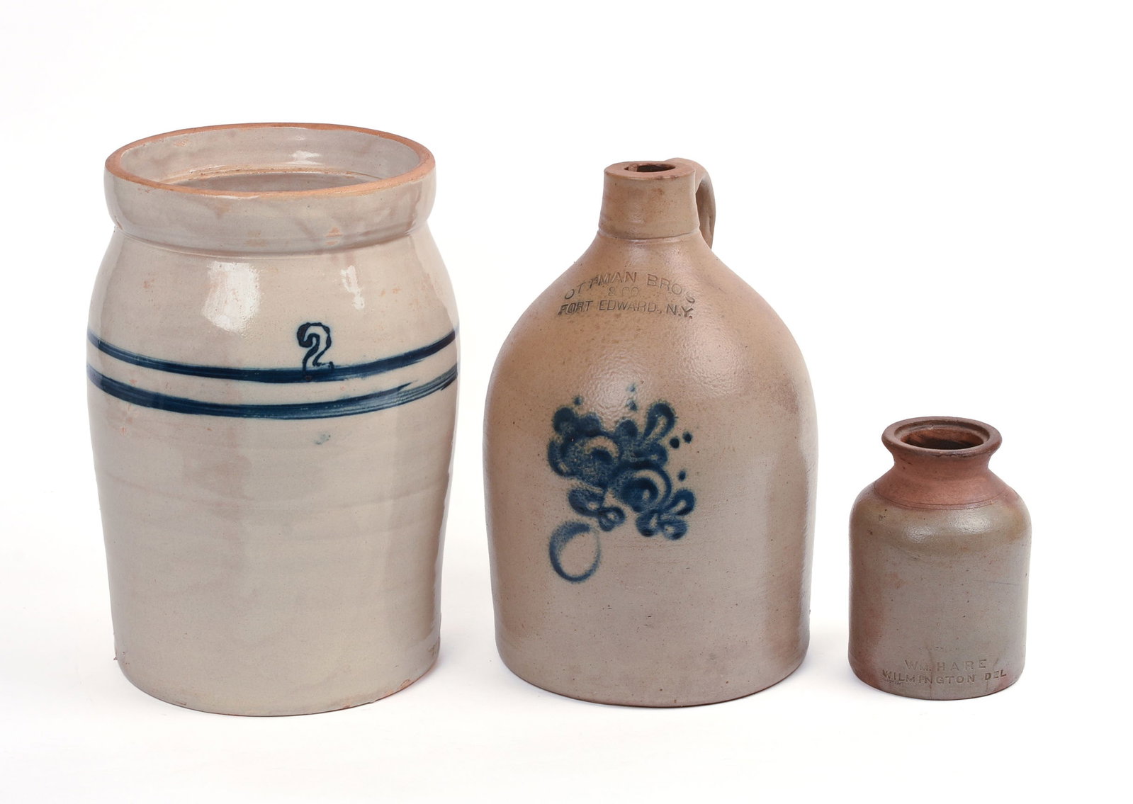 THREE STONEWARE PIECES.: Ottman Brothers two-gallon jug (height 11 inches), a two-gallon crock, and a small crock from Wm. Hare, Wilmington.