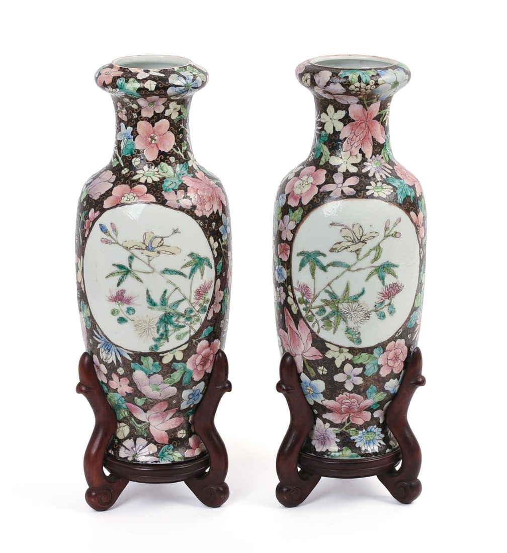 PAIR OF REPUBLIC PERIOD CHINESE FAMILLE NOIRE VASES.: Qianlong seal mark on bases. Height 12.5 inches excluding stands.