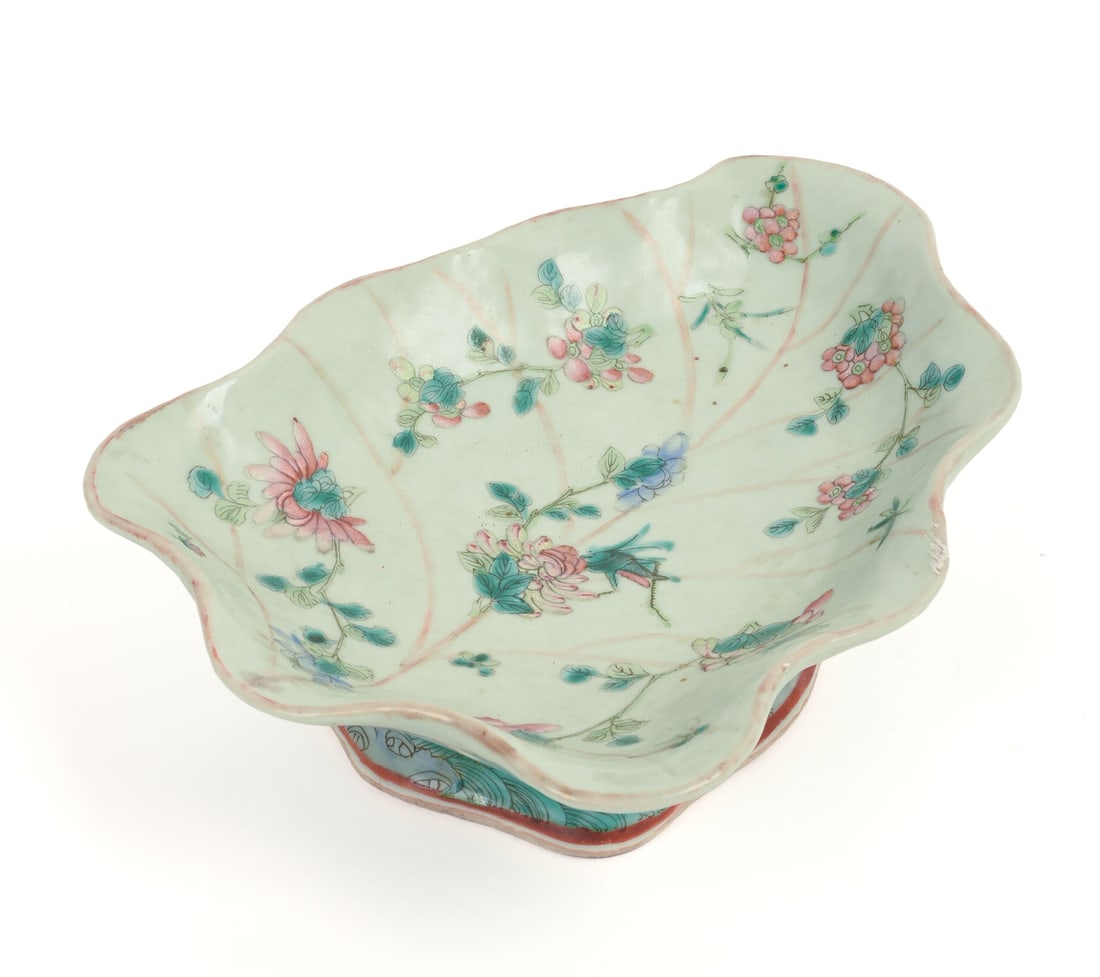 MID-19TH CENTURY CHINESE LEAF FORM DISH.: Celadon ground and famille rose. Length 10.25 inches.