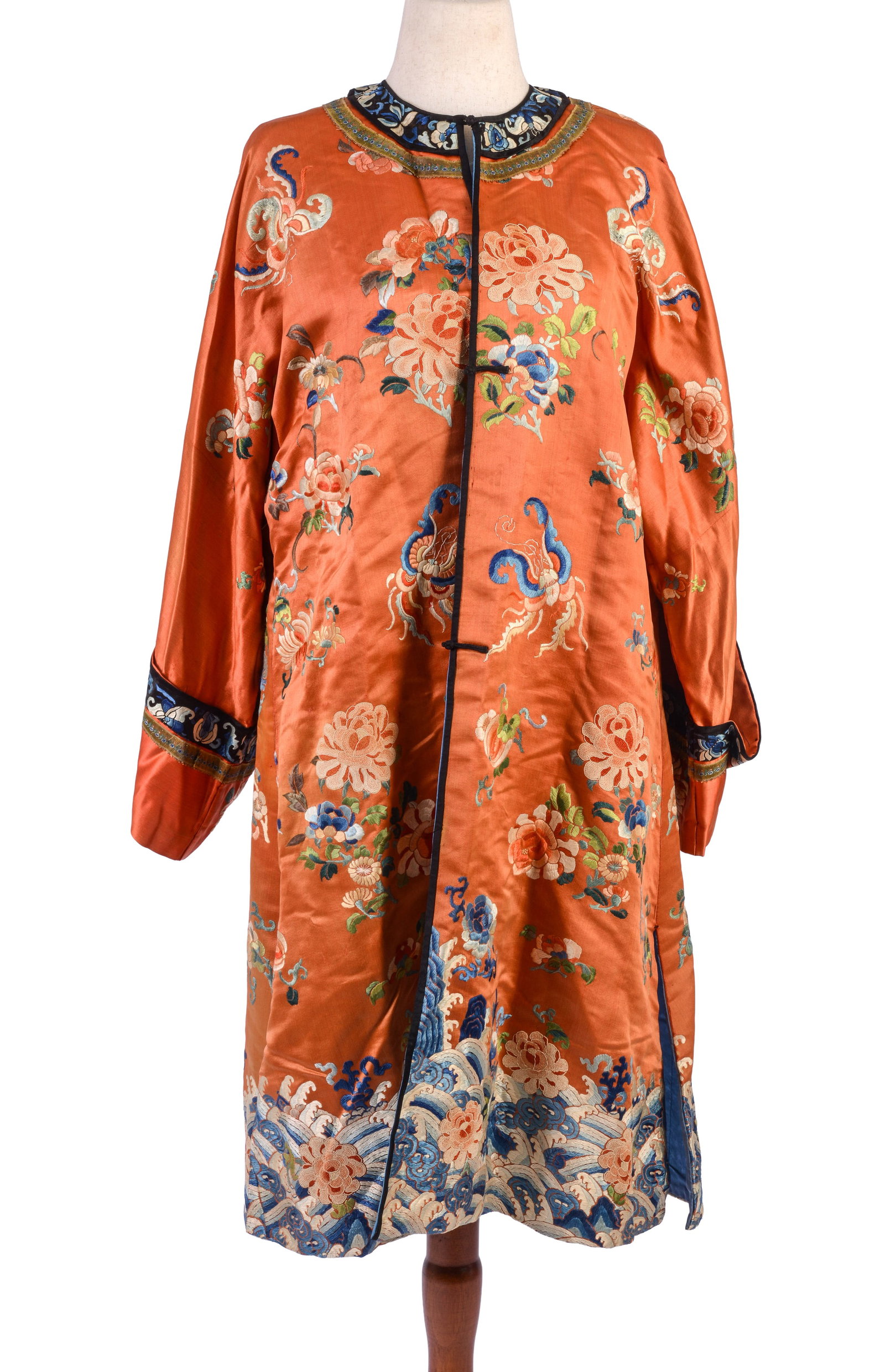 19TH CENTURY CHINESE QING DYNASTY WOMEN'S INFORMAL ROBE.: Apricot ground. Length 41.5 inches, underarm to underarm 24 inches. Small tears and a stain.
