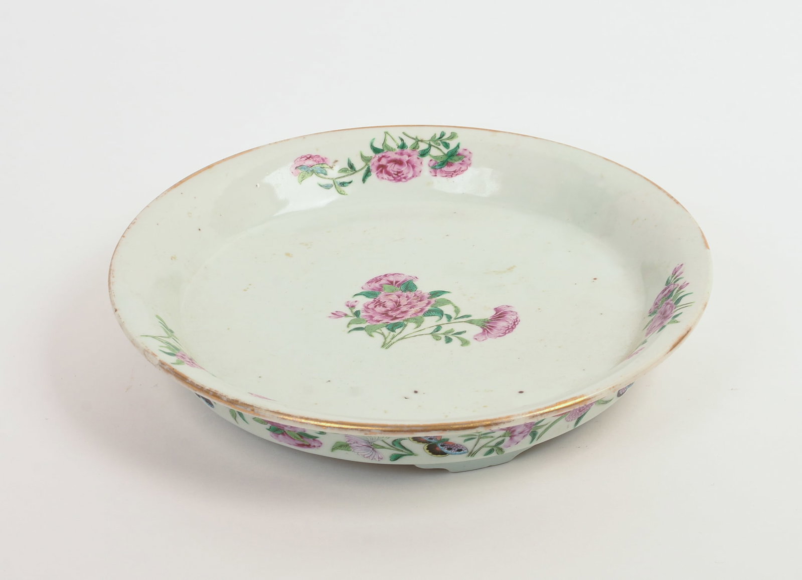19TH CENTURY CHINESE FAMILLE ROSE FOOTED TRAY.: With flowers and butterfly repeat outer border. Width 11 inches.