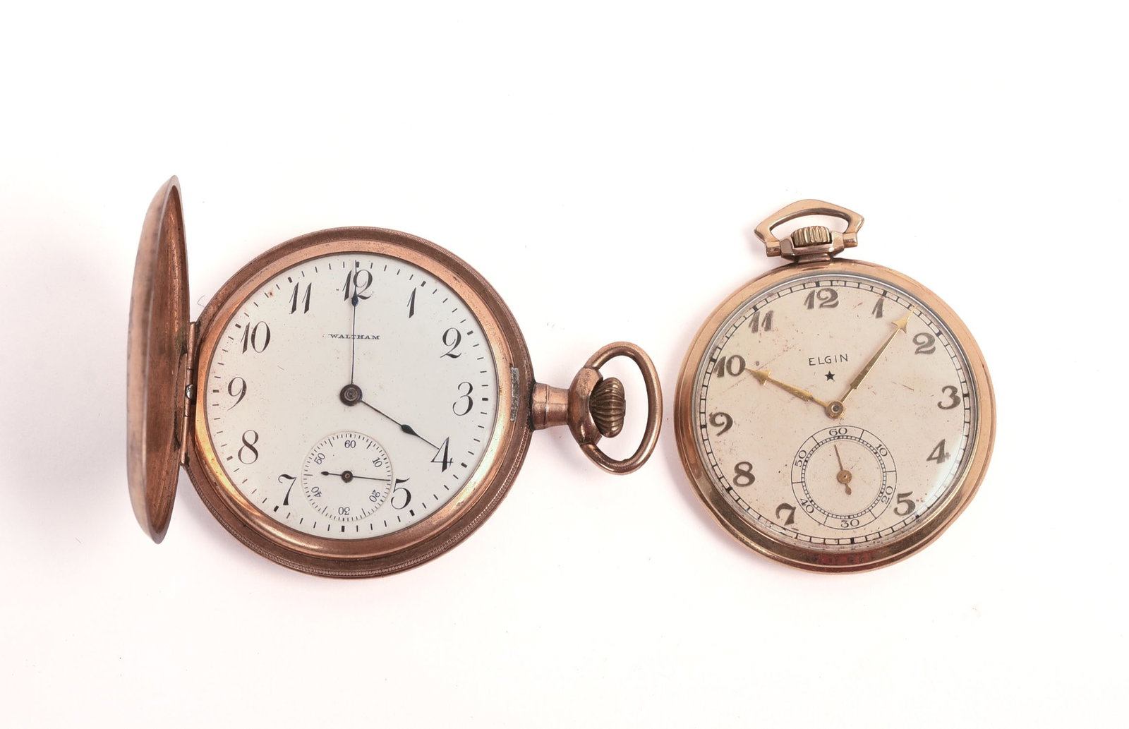 TWO GOLD-FILLED AMERICAN POCKET WATCHES.: Waltham, Elgin, diameters 1.75 and 2 inches. Not tested for operation.