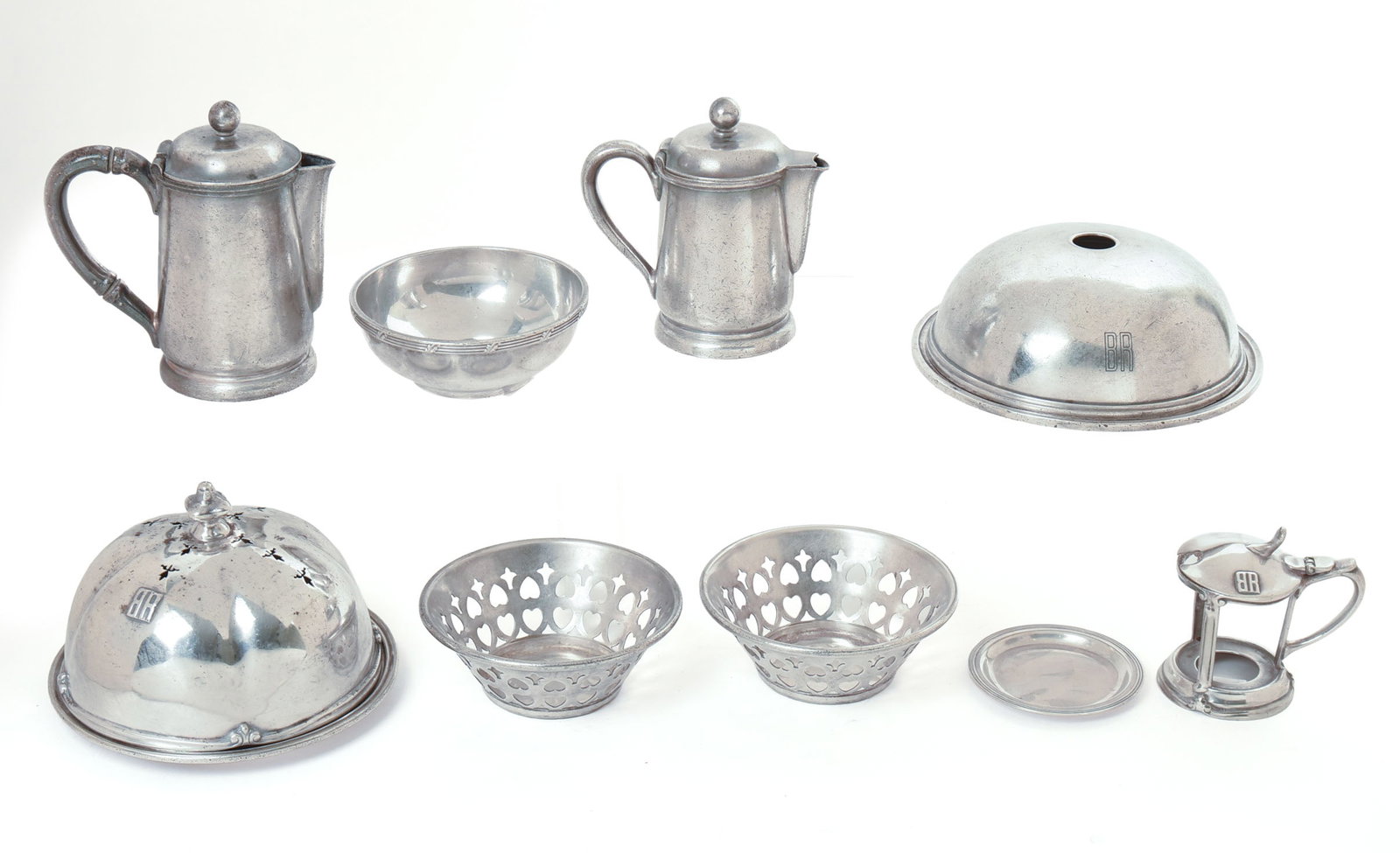 GROUP OF CHICAGO, BURLINGTON, AND QUINCY RAILROAD SILVER.: Includes two covered dishes, two coffee pots, a small bowl, and others. 9 pieces total. Height of taller pitcher 6 inches.