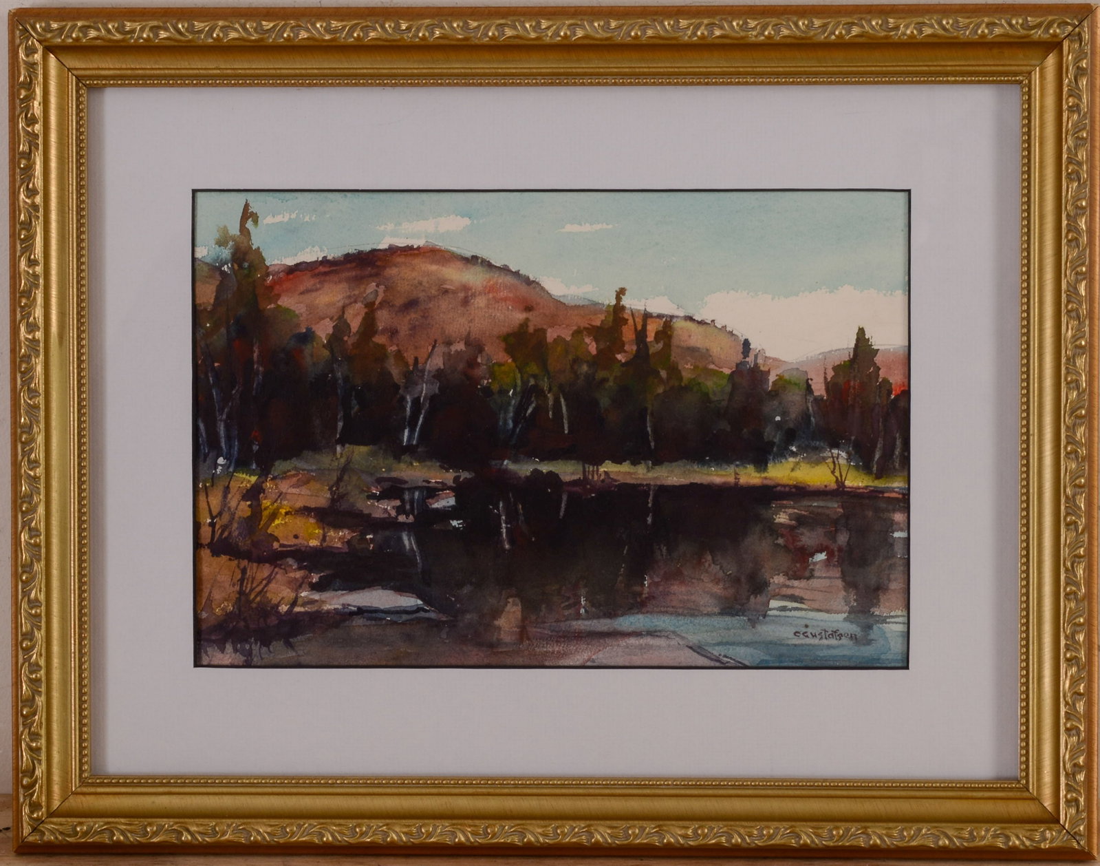 CARL A.S. GUSTAFSON (1910 - 2011). THE MOUNTAIN POND, NEW HAMPSHIRE.: Framed watercolor on paper, signed lower right. Sight 8 x 12 inches. Frame 14 x 18 inches.
