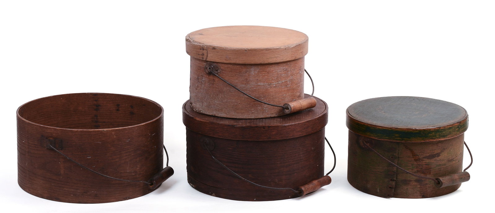FOUR BALE-HANDLED PANTRY BOXES.: Diameters 9.5 to 11.5 inches.