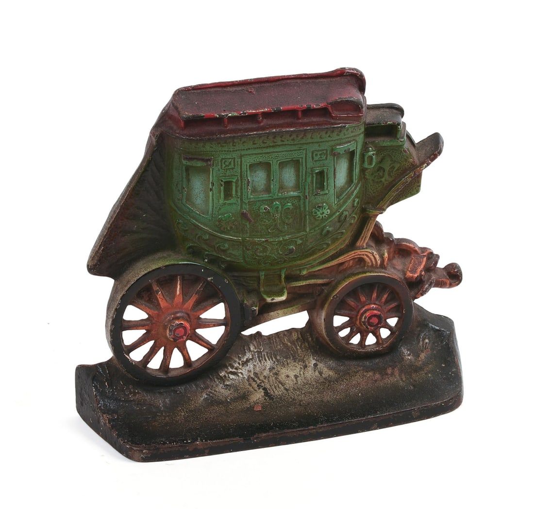 CAST IRON STAGECOACH DOORSTOP.: Copyright C. co 1930. 7 x 9 inches.
