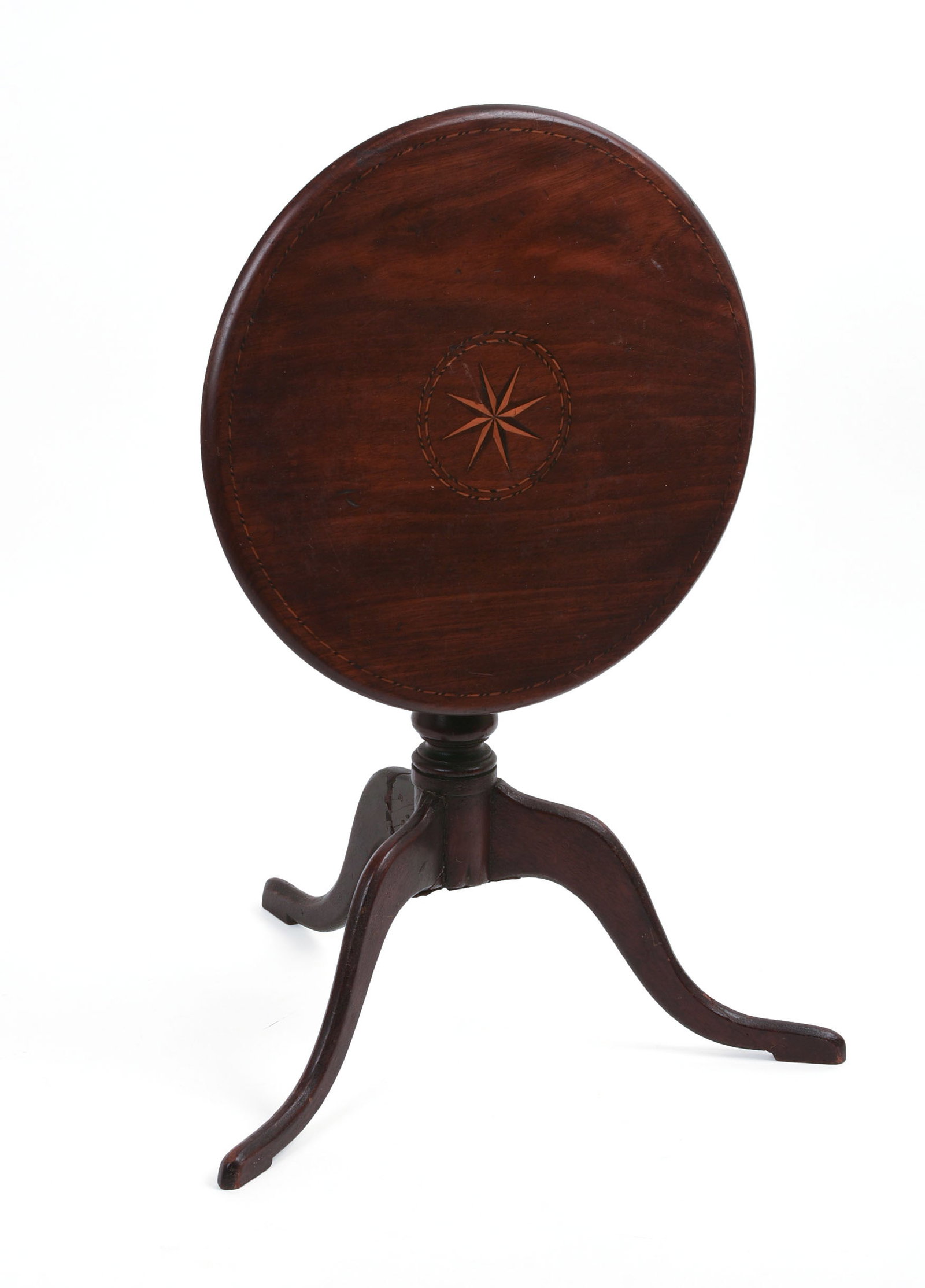 RARE 18TH CENTURY MAHOGANY QUEEN ANNE MINIATURE TILT-TOP TABLE.: Top having compass star inlay. Height 12 inches, diameter of top 11 inches. Repair to one foot, small loss to one leg.
