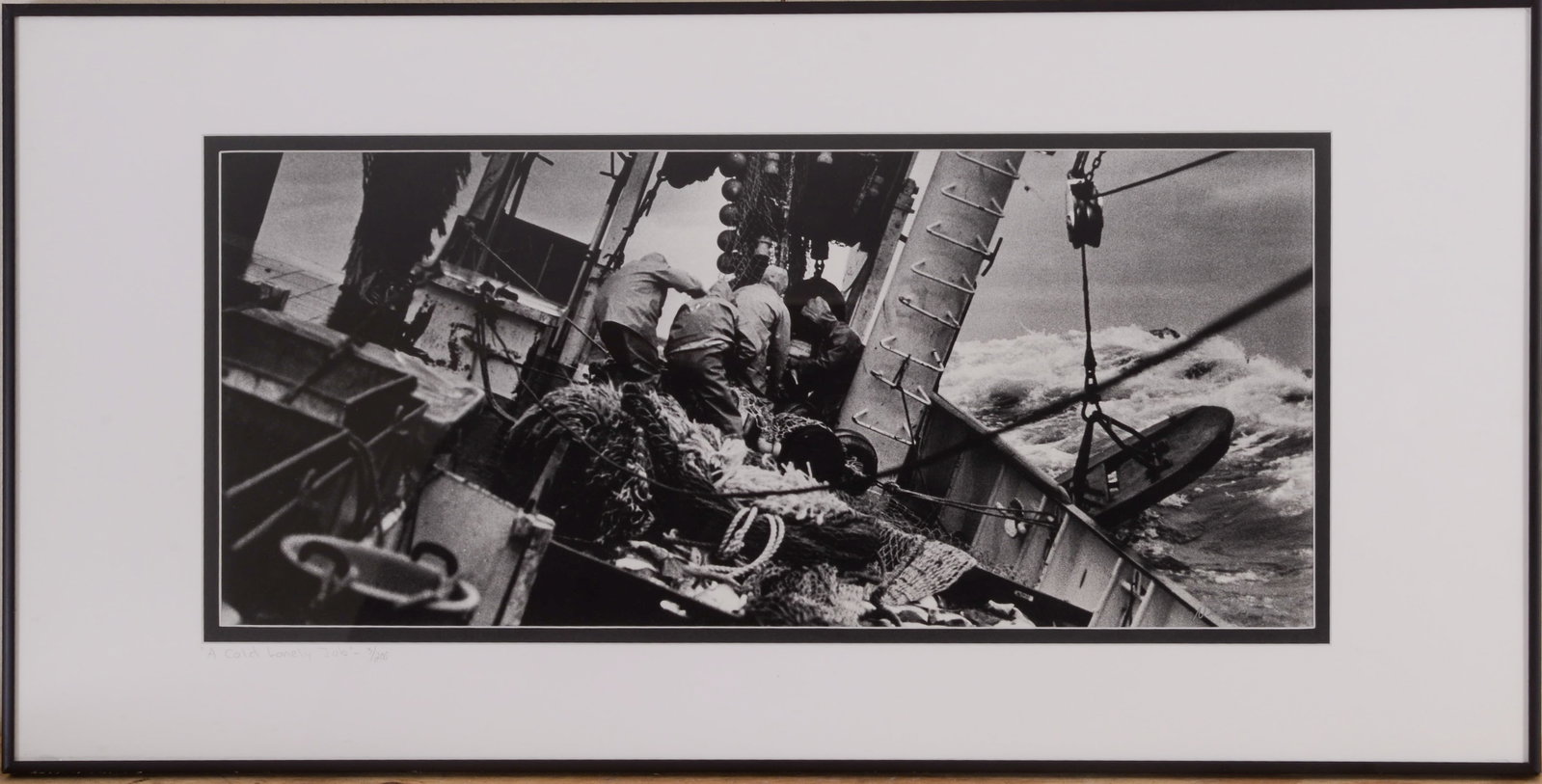 NEAL PARENT. A COLD LONELY JOB, BELFAST.: Framed silver gelatin print, signed lower right. Sight 10 x 23 inches. Frame 16 x 32 inches.
