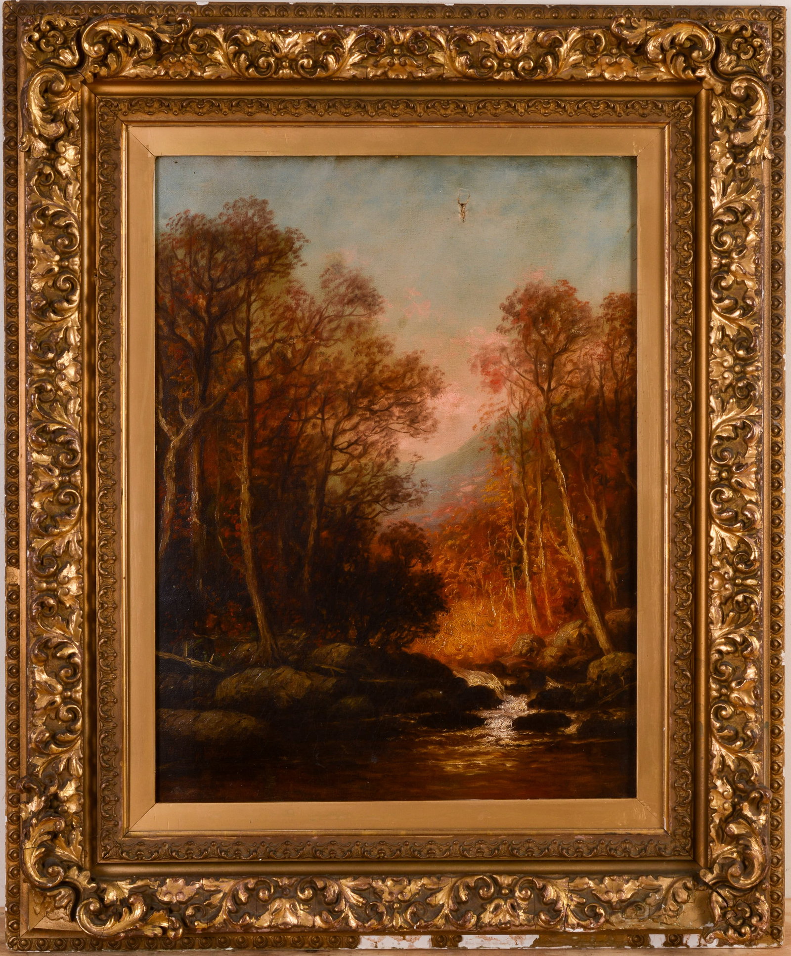 WESLEY ELBRIDGE WEBBER (1841 - 1914). MOUNTAIN STREAM.: Large oil on canvas in original frame depicting mountain stream, probably New Hampshire. Signed lower left. Sight 24 x 18 inches. Tear to upper right of canvas, some losses to frame.