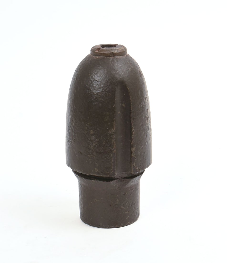 CIVIL WAR SIX-INCH HOTCHKISS ARTILLERY SHELL.: Length 6 inches. Good condition.
