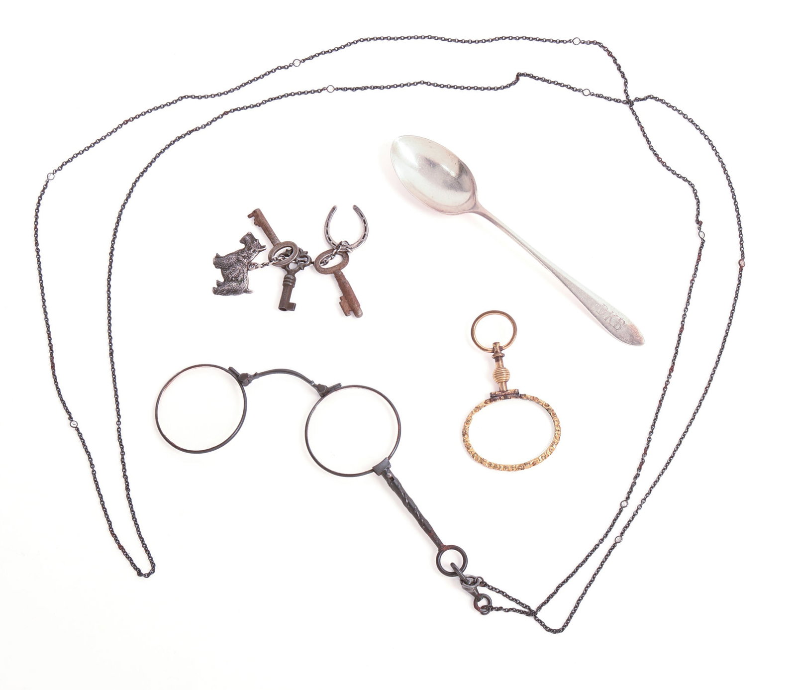 GROUP OF VICTORIAN PIECES.: Two magnifiers, sterling baby spoon, and a sterling Scottie dog keychain.
