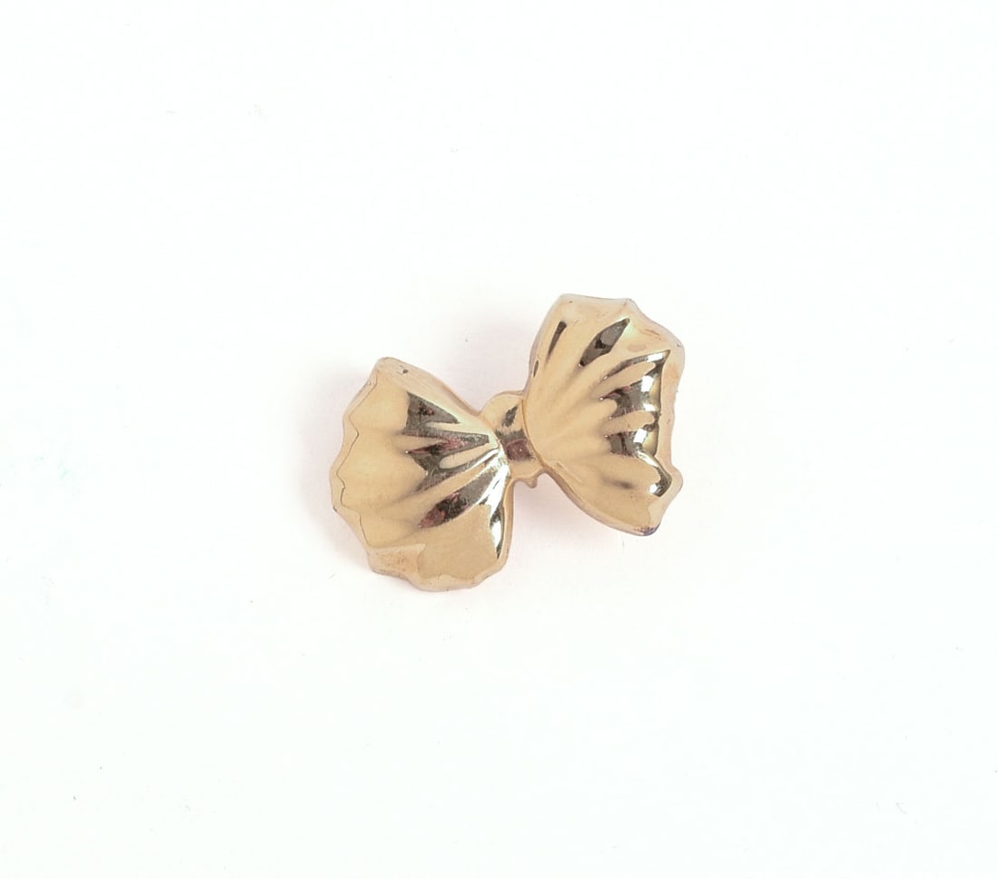 MARC ANTHONY 14K GOLD BOW PENDANT.: 1.77 grams, 1 x 0.5 inches.