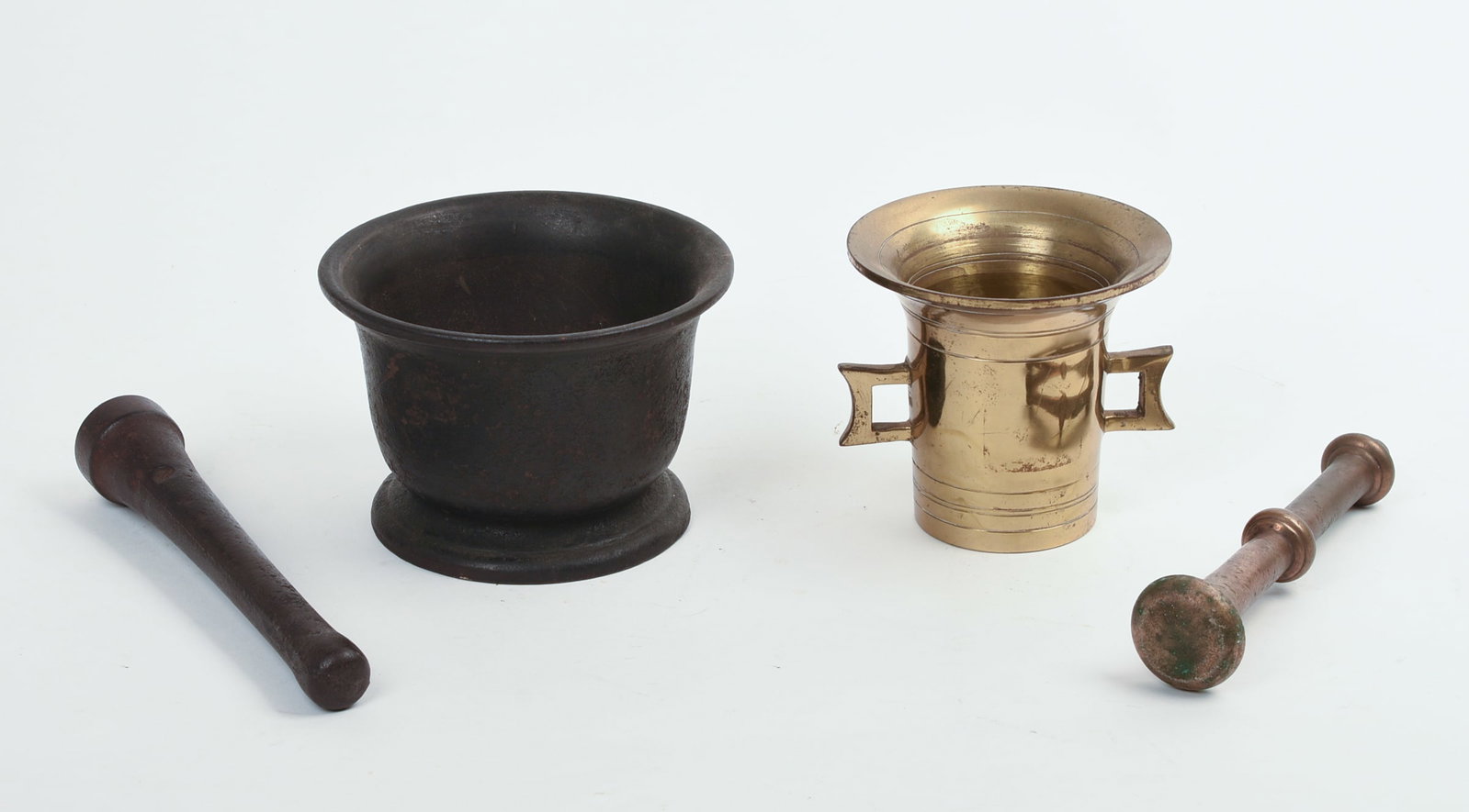TWO MORTAR AND PESTLES. - 2