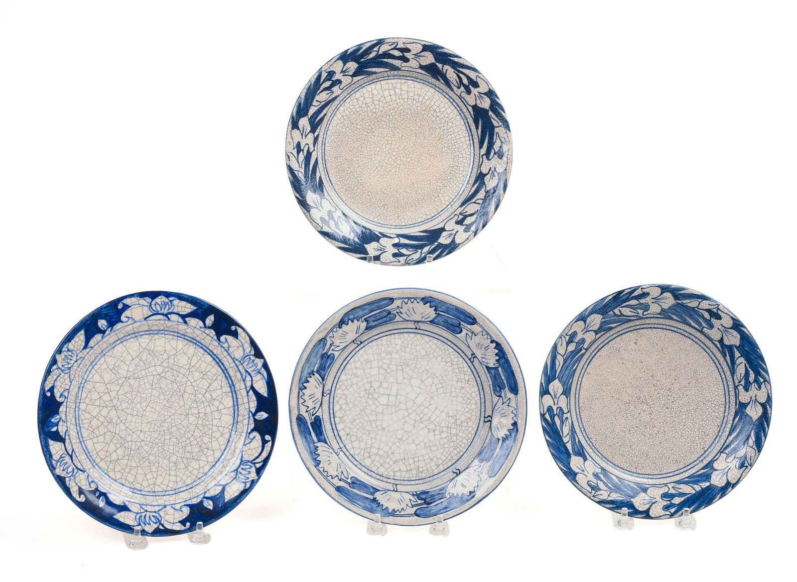 FOUR DEDHAM POTTERY FLORAL PATTERN PLATES.: Diameter 8.25 inches. Good condition.