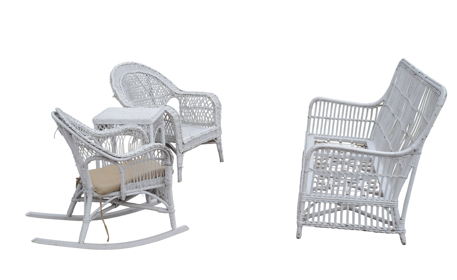 FOUR PIECE WICKER PATIO FURNITURE SET.: Includes sofa (length 63 inches). rocking chair, armchair, and side table. Lacking cushions.