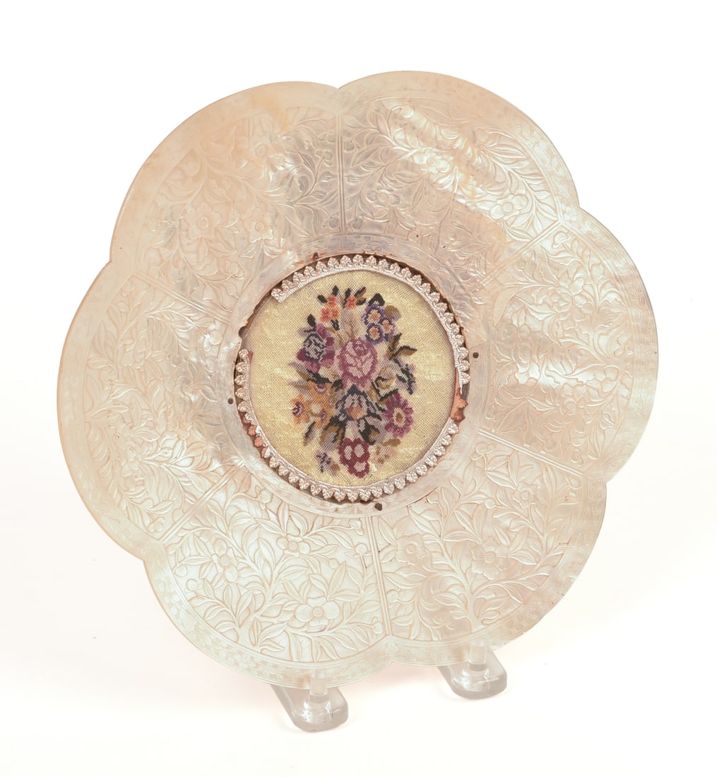 Chinese Carved Mother of Pearl Frame: 19th century, for a 3 inch round image, overall diameter 8.25 inches. Losses, rim chip.