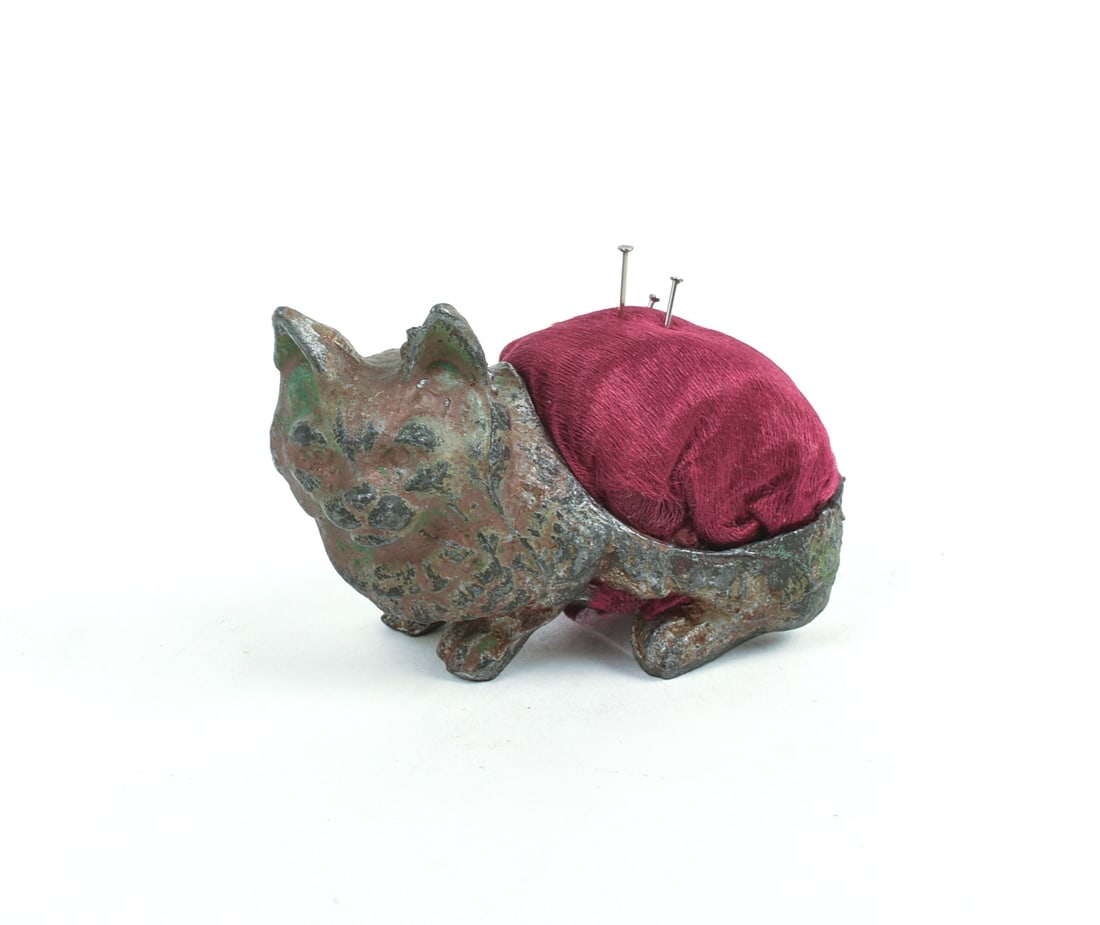Cast Metal Cat Pincushion.: Length 2.5 inches.