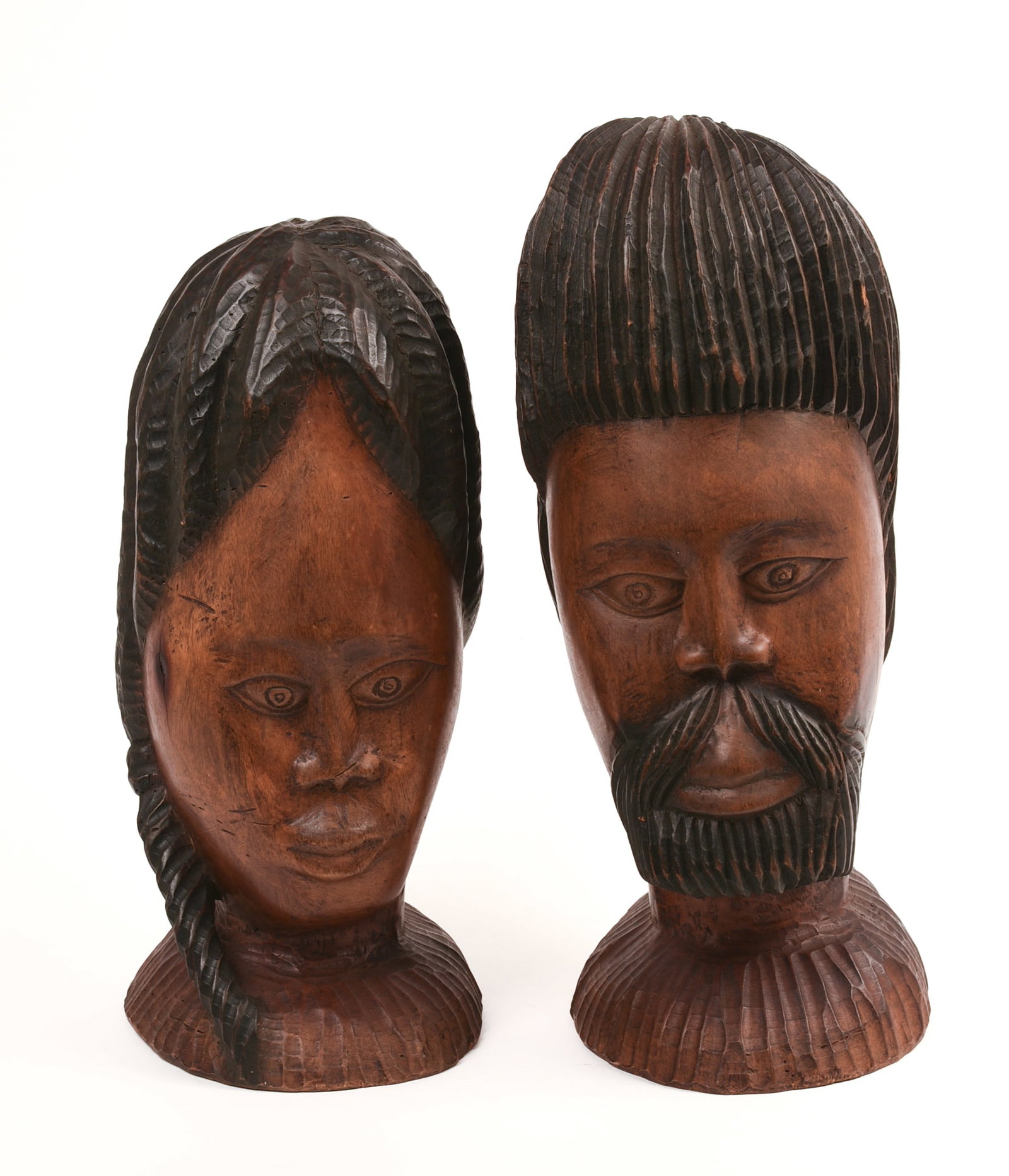 Pair of African Carved Hardwood Busts.: Height 16 inches.