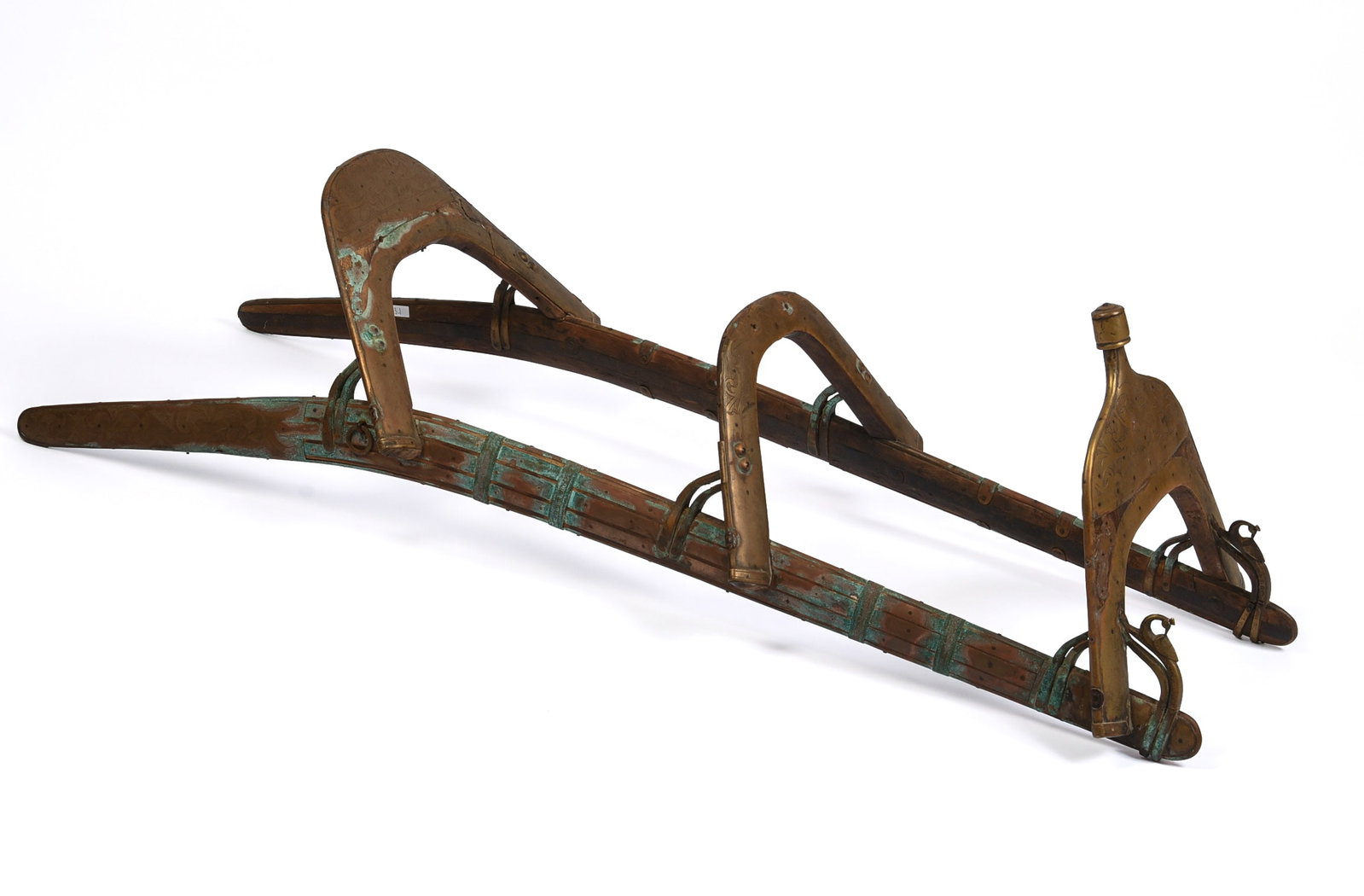 Vintage Camel Saddle.: Brass and teak, length 51 inches.
