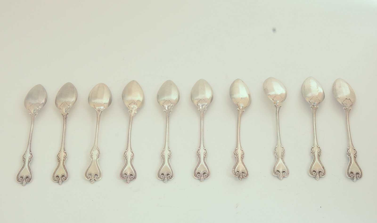 Ten Sterling Silver Grapefruit Spoons. - 2