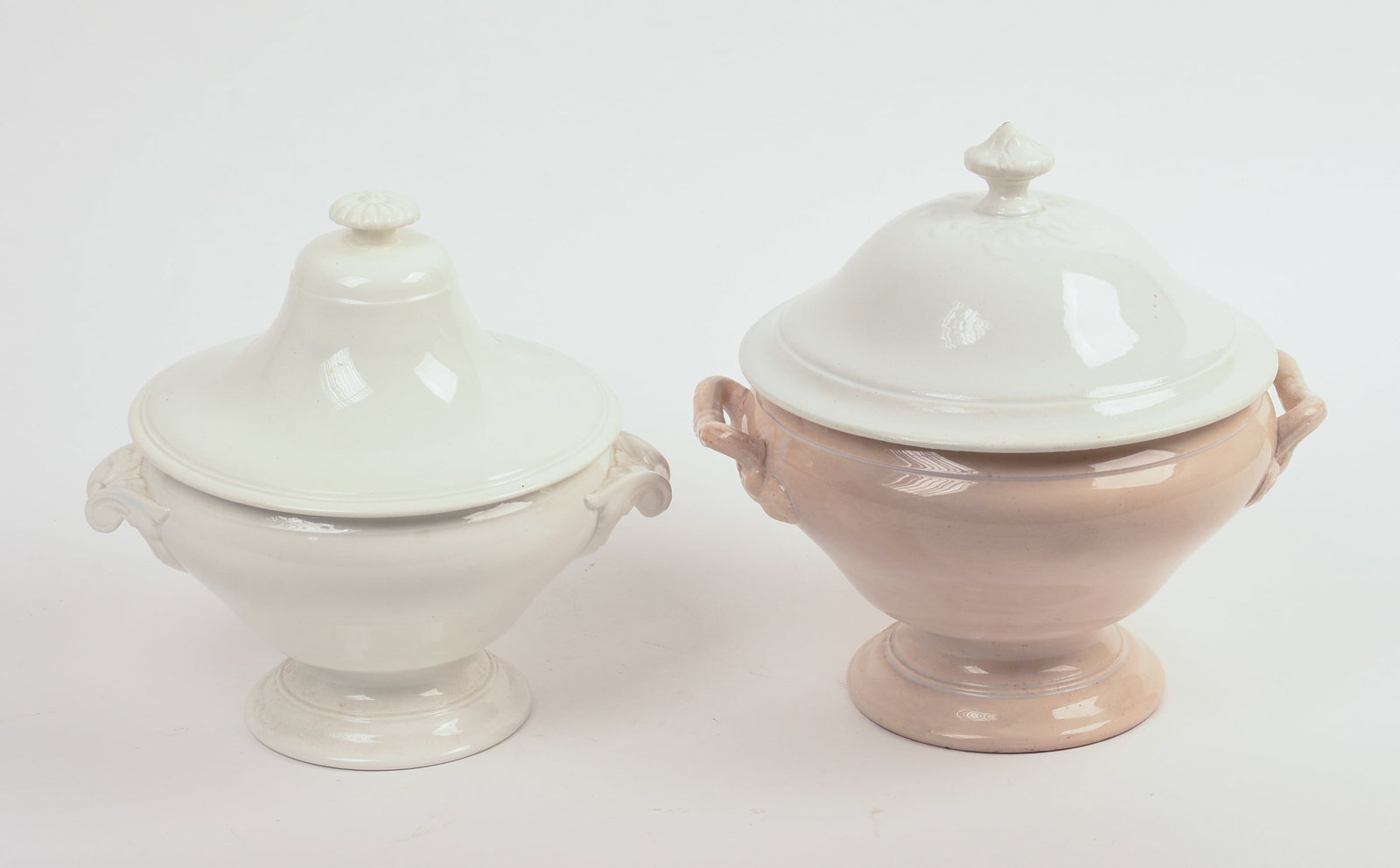 Two French Porcelain Soup Tureens.: Heights 10 and 11 inches. A few hairlines.