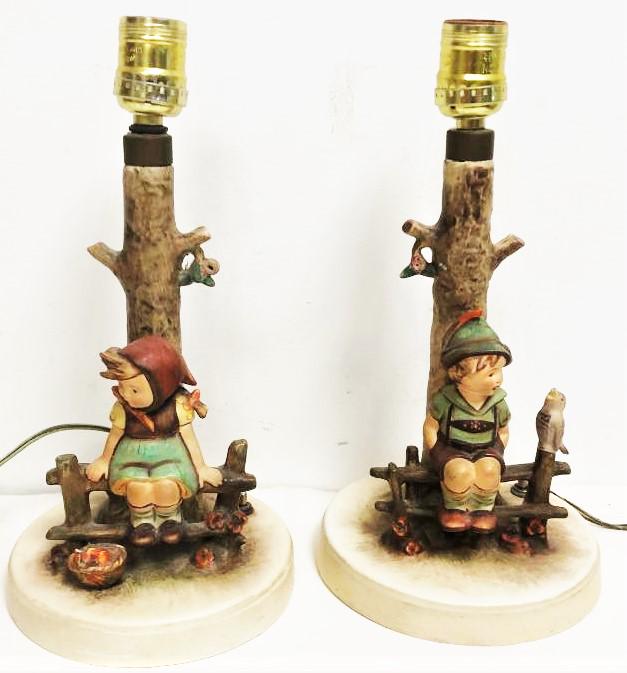 Â pair of fine porcelain M.I. Hummel figurine lamp: Â pair of fine porcelain M.I. Hummel figurine lamp bases from Goebel measures 14" h