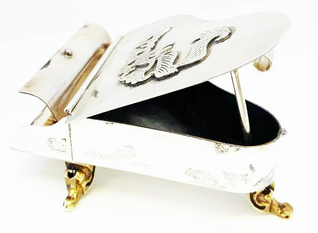 Vintage Netafim Judaica Sterling Grand Piano Besamim: The articulated lid with applied lettering translating roughly as "In the Air," with an articulated keyboard cover opening to "keys," the underside stamped "Sterling by Netafim." Weight approximately 
