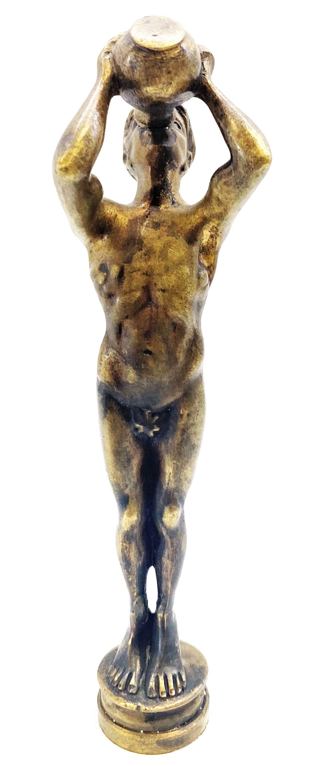 Antique bronze Greek Male figure witch vessel wax seal: Antique bronze Greek Male figure witch vessel wax seal ,measures 5" inches