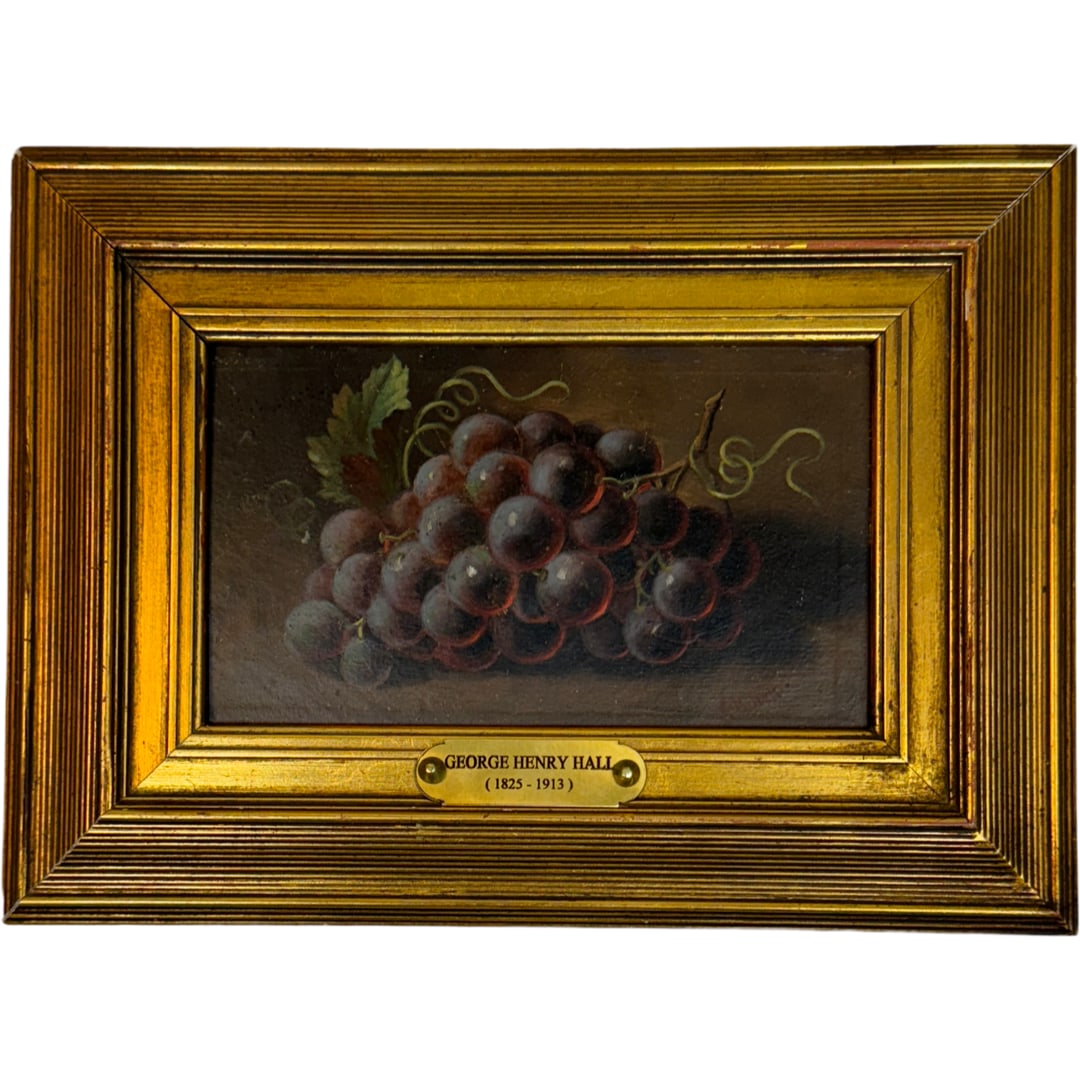 George Henry Hall (1825 - 1913) American: George Henry Hall (1825 - 1913) Oil on panel depicting grape still life, piece is signed lower right "G.H. Hall", painting measures 4 x 6 3/4 and 8 x 10 3/4 in beautiful gilt frame with placque. Back