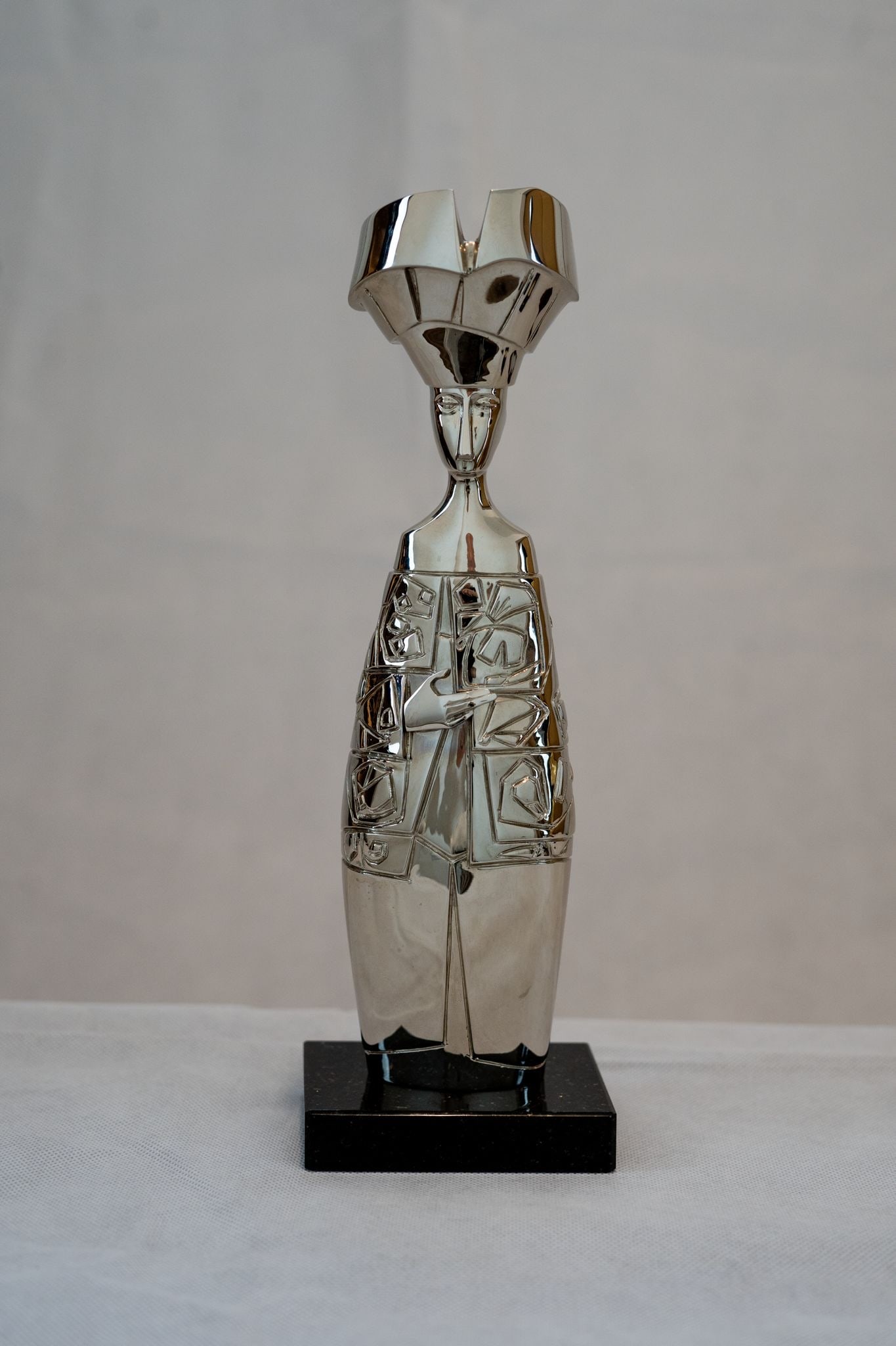 Cundo Bermudez (1914-2008) Silver Colored Sculpture: Cundo Bermudez (1914-2008) Bronze Silver plated, Bronze sculpture 12" tall. Bronze Base is 2 x 3 inches. This a series set of one of each color with 50 being made of each in purpose of the 10 year ann