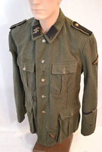 WWII GERMAN SS ENLISTED M40 SERVICE TUNIC NORDLAND: WWII GERMAN SS ENLISTED M40 SERVICE TUNIC . NORDLAND DANISH DIVISION.WELL WORN MANY HOLED AND REPAIRS. RARE TUNIC. RUSSIAN CAPTURE INK STAMPS .