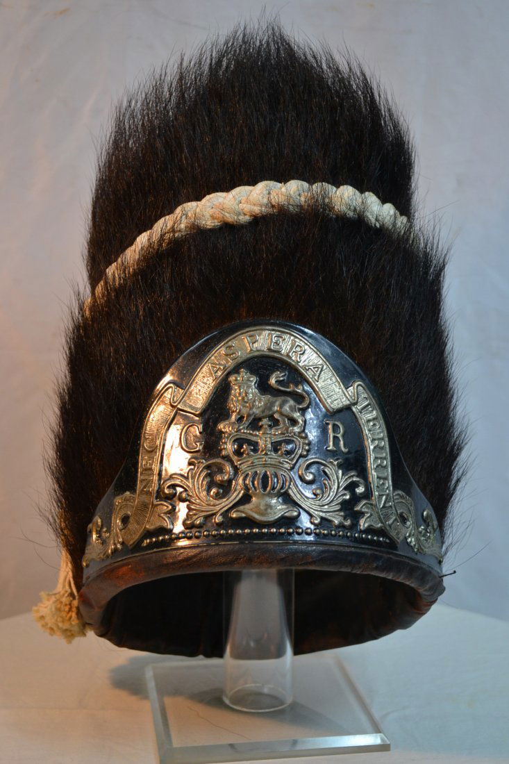 BRITISH GRENADIER BEAVER FUR BUSBY HAT: BRITISH GRENADIER BEAVER FUR BUSBY HAT . VERY NICE PIECE. NOT SURE OF THE AGE BUT ITS NOT A NEW REPRODUCTION. POSSIBLE VICTORIAN MADE TO USE IN THE PARADE . WEAR TO LEATHER SWEATBAND INSIDE OTHERWISE