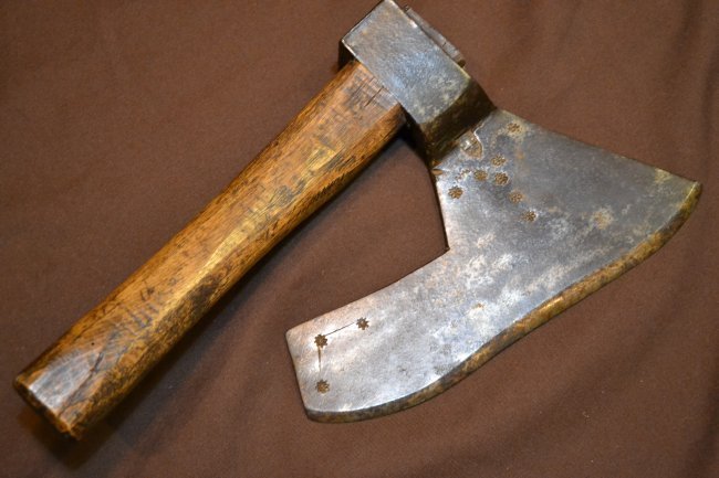 ANTIQUE MEDIEVAL STYLE FORGED BEARDED AXE: ANTIQUE MEDIEVAL STYLE FORGED BEARDED AXE . METAL DISPLAYS A GREAT AGE . SMITH STAMP AS WELL AS OTHER DECORATING STAMPS . 10 3/8" LONG EDGE .12" LONG OLD WOOD HANDLE.