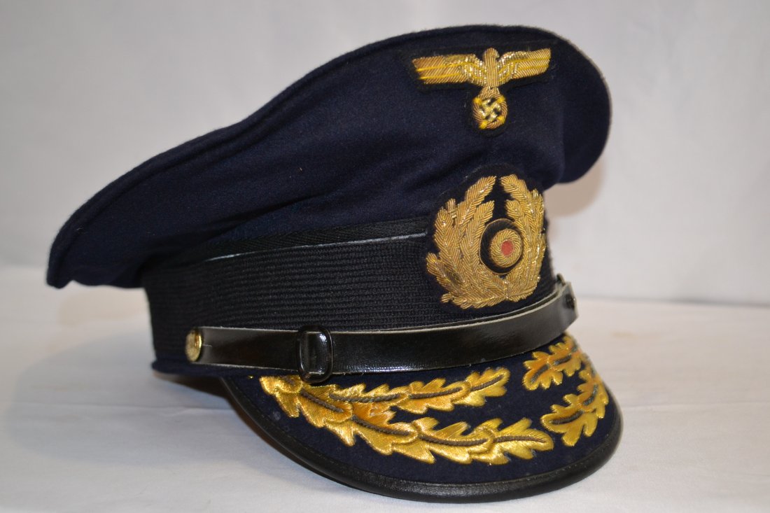 WWII NAZI NAVY ADMIRAL VISOR HAT QUALITY REPRODUCTION: WWII NAZI NAVY ADMIRAL VISOR HAT. VERY HIGH QUALITY REPRODUCTION MADE BY ORIGINAL GERMAN COMPANY THAT MADE THESE DURING THE WAR . NICE AND CLEAN . BEAUTIFUL GOLD BULLION WORK ON THE VISOR AND INSIGNIA