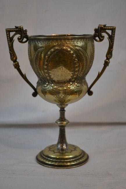 1873 BRITISH MILITARY SILVER CUP TROPHY: 1873 BRITISH MILITARY SILVER CUP TROPHY . PRESENTED TO SERGT. GIBSON IN AUGUST 1873 FOR THE 1ST PRIZE IN 97TH I.R.B. COMPANY COMPETITION. 4" DIAMETER AND 8" TALL . GREAT CONDITION WITH NICE AGE PATINA
