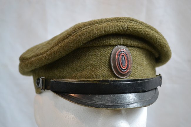 WWI IMPERIAL RUSSIAN WARTIME KHAKI VISOR HAT CAP: WWI IMPERIAL RUSSIAN WARTIME KHAKI VISOR HAT CAP. RARE WELL WORN ORIGINAL HAT . IMPERIAL COCKADE .