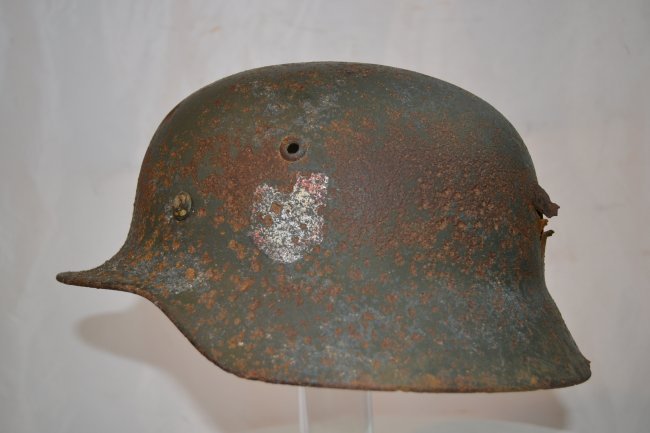 WWII GERMAN M35 SS DD QUIST SNIPER KILL HELMET NAMED: WWII GERMAN M35 SS DD QUIST SNIPER KILL HELMET . EXTREMELY DESIRABLE HELMET. IF IT COULD ONLY TALK ! REMNANTS OF WHERE SS DECAL WAS AND NATIONAL SHIELD WITH SWASTIKA IS STILL VISIBLE. DOUBLE SNIPER HI