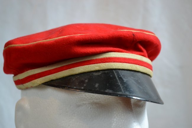 IMPERIAL GERMAN RED STUDENT VISOR HAT CAP: IMPERIAL GERMAN RED STUDENT VISOR HAT CAP . HARD TO FIND. GOOD CONDITION WITH SOME MOTH HOLES . NAMED