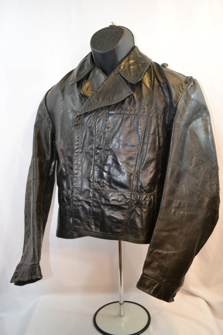 WWII WAFFEN SS HJ DIVISION LEATHER PANZER WRAP JACKET: WWII WAFFEN SS HJ DIVISION LEATHER PANZER WRAP JACKET . RARE AND HIGHLY DESIRABLE JACKET. MADE FROM KRIEGSMARINE ISSUED LEATHER JACKET FOR U-BOAT CREW. STILL RETAINS KRIEEGSMARINE STAMP WITH EAGLE OVE