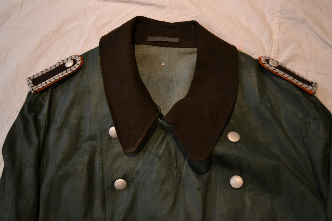 WWII GERMAN POLICE OFFICER RAIN COAT: WWII GERMAN POLICE OFFICER RAIN COAT . RUBBERIZED MATERIAL . WELL WORN CONDITION.